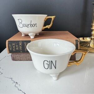 Creative Co-op Stoneware Bourbon + Gin 3 Footed w Gold Handle Tea Cup set of 2